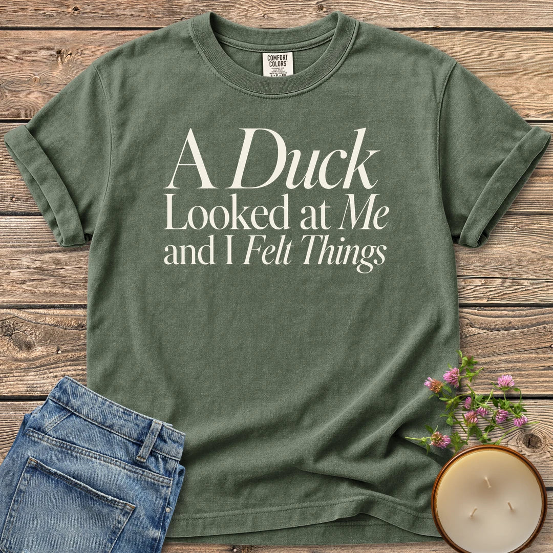 A Duck Looked at Me t-shirt, A Duck Looked at Me and I Felt Things in elegant serif and italic type, on a Moss Comfort Colors tee