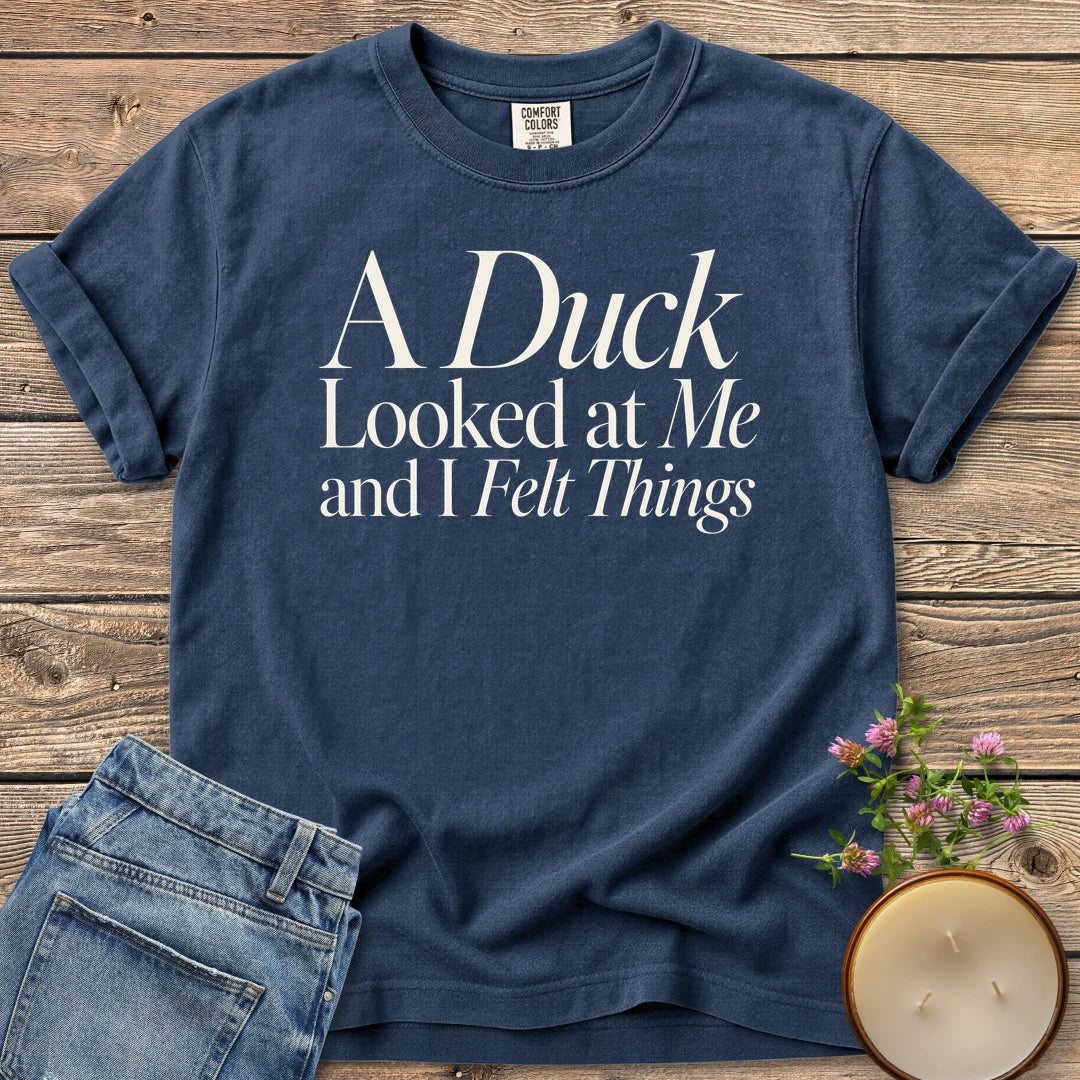 A Duck Looked at Me t-shirt, A Duck Looked at Me and I Felt Things in elegant serif and italic type, on a Navy Comfort Colors tee