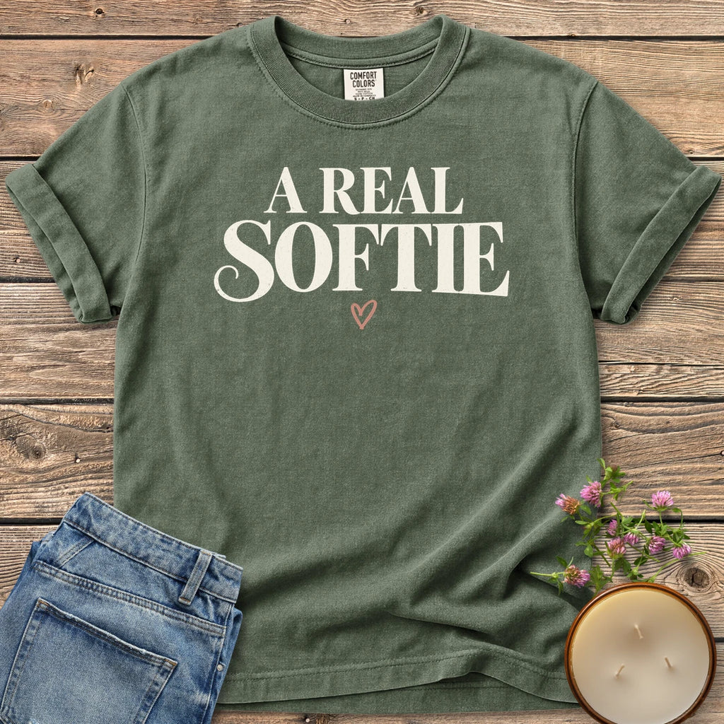 A Real Softie Vintage t-shirt, A Real Softie in vintage serif type with a small heart, on a Moss Comfort Colors tee