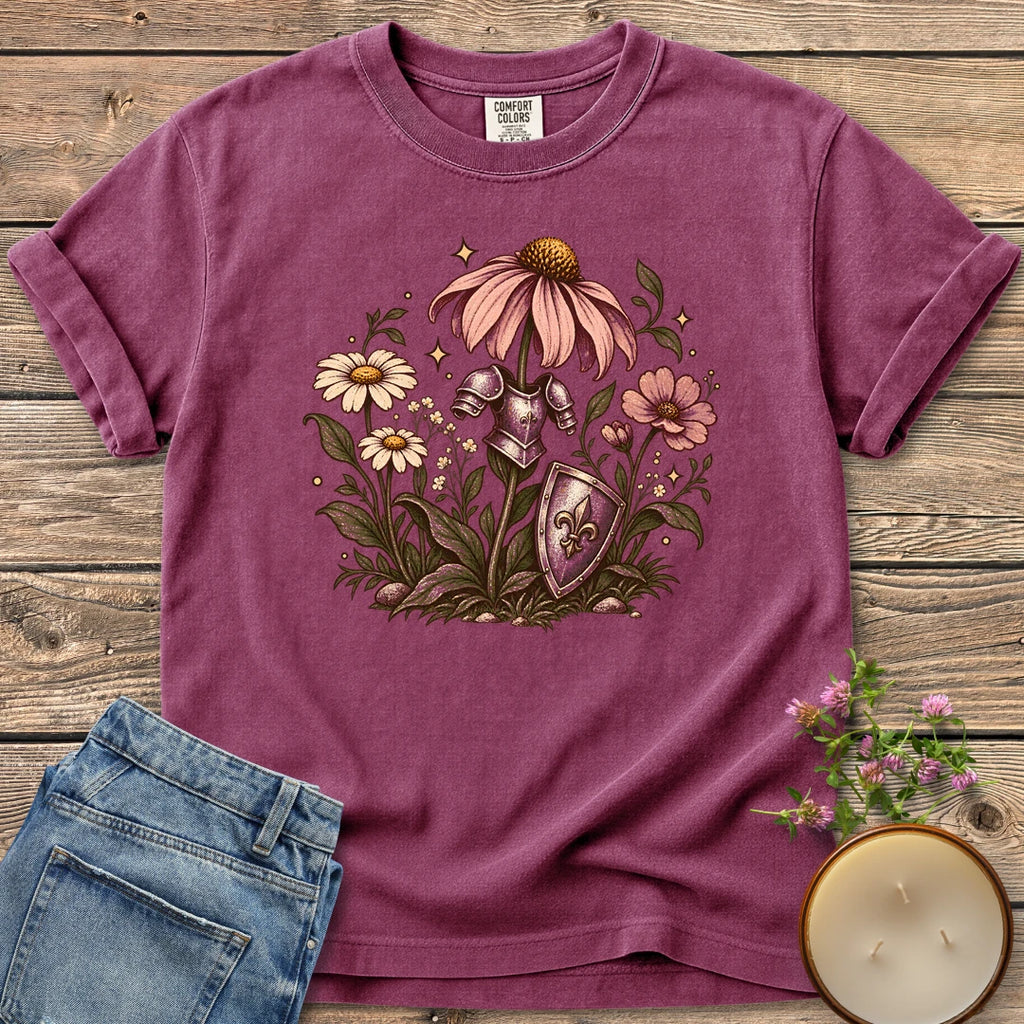 Armored Flower Knight t-shirt, pink coneflowers and daisies wearing a knight's armor and shield, on a Berry Comfort Colors tee
