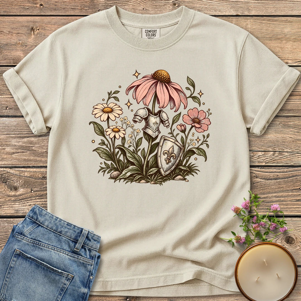Armored Flower Knight t-shirt, pink coneflowers and daisies wearing a knight's armor and shield, on an Ivory Comfort Colors tee