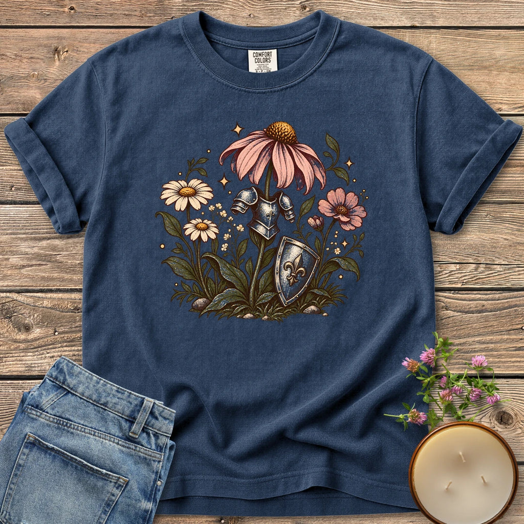 Armored Flower Knight t-shirt, pink coneflowers and daisies wearing a knight's armor and shield, on a Navy Comfort Colors tee