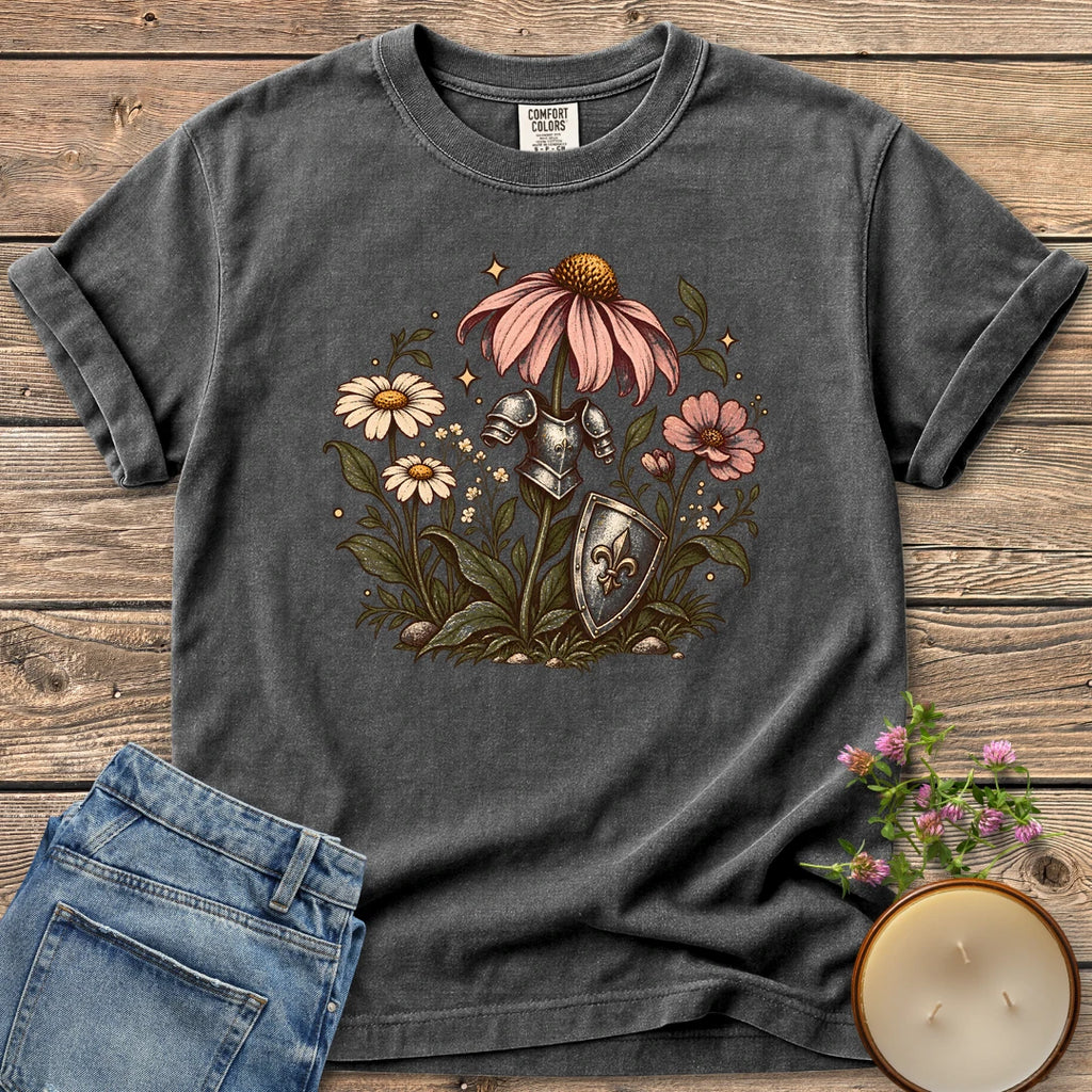 Armored Flower Knight t-shirt, pink coneflowers and daisies wearing a knight's armor and shield, on a Pepper Comfort Colors tee