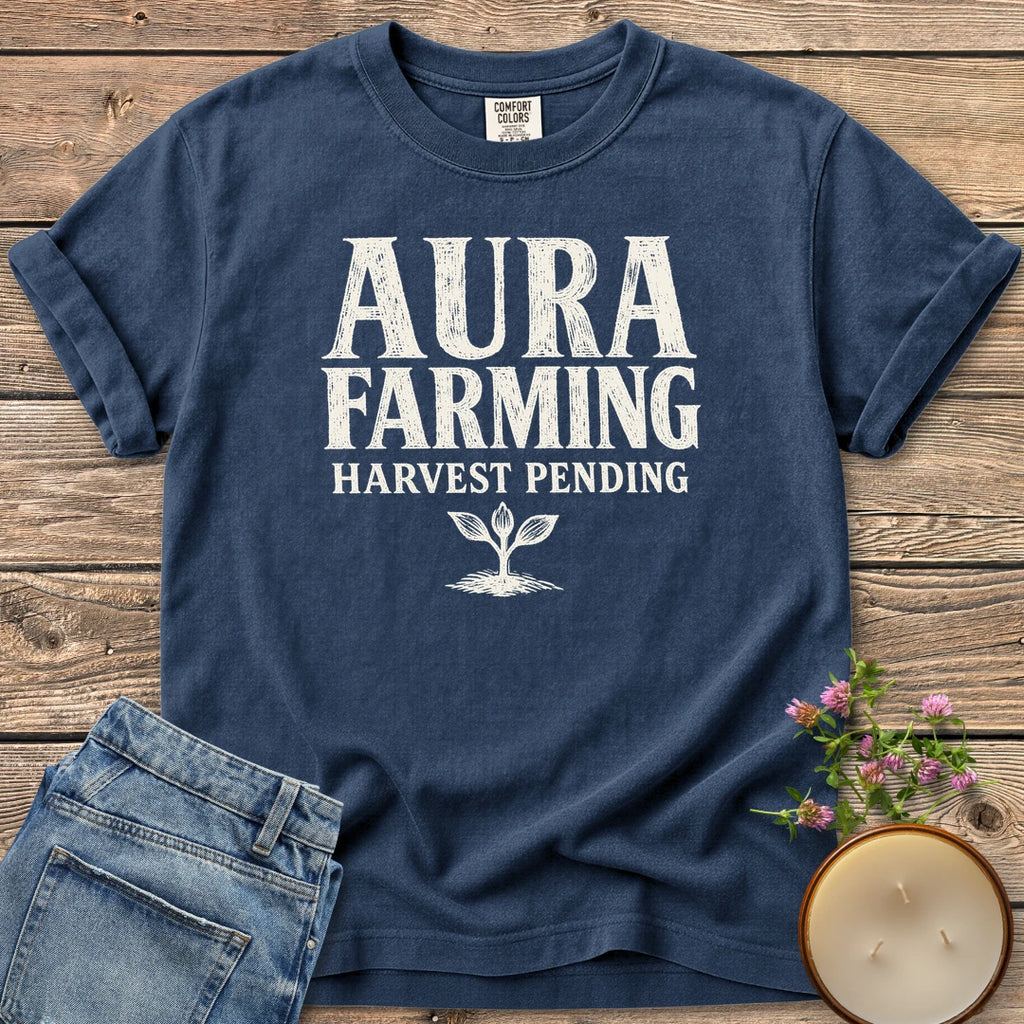 Aura Farming Harvest Pending t-shirt, Aura Farming in woodcut letters with Harvest Pending and a small sprout, on a Navy Comfort Colors tee