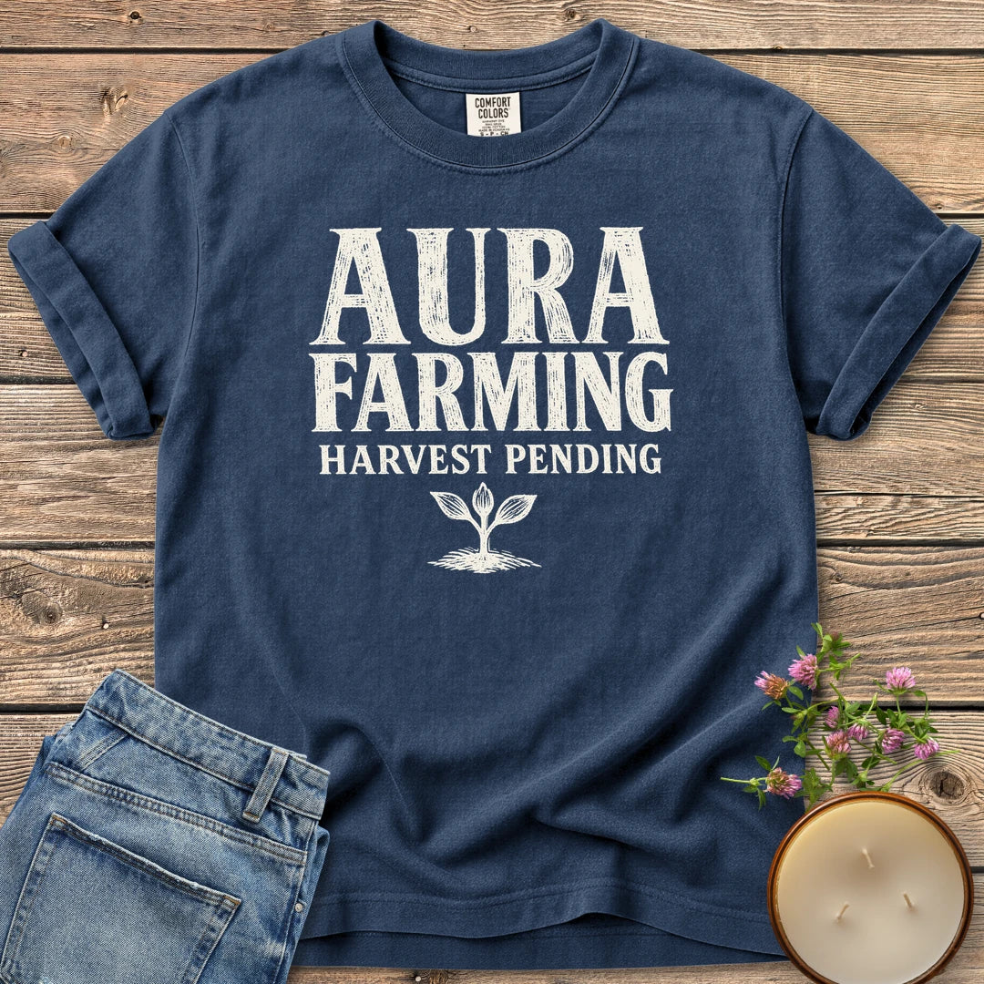 Aura Farming Harvest Pending t-shirt, Aura Farming in woodcut letters with Harvest Pending and a small sprout, on a Navy Comfort Colors tee