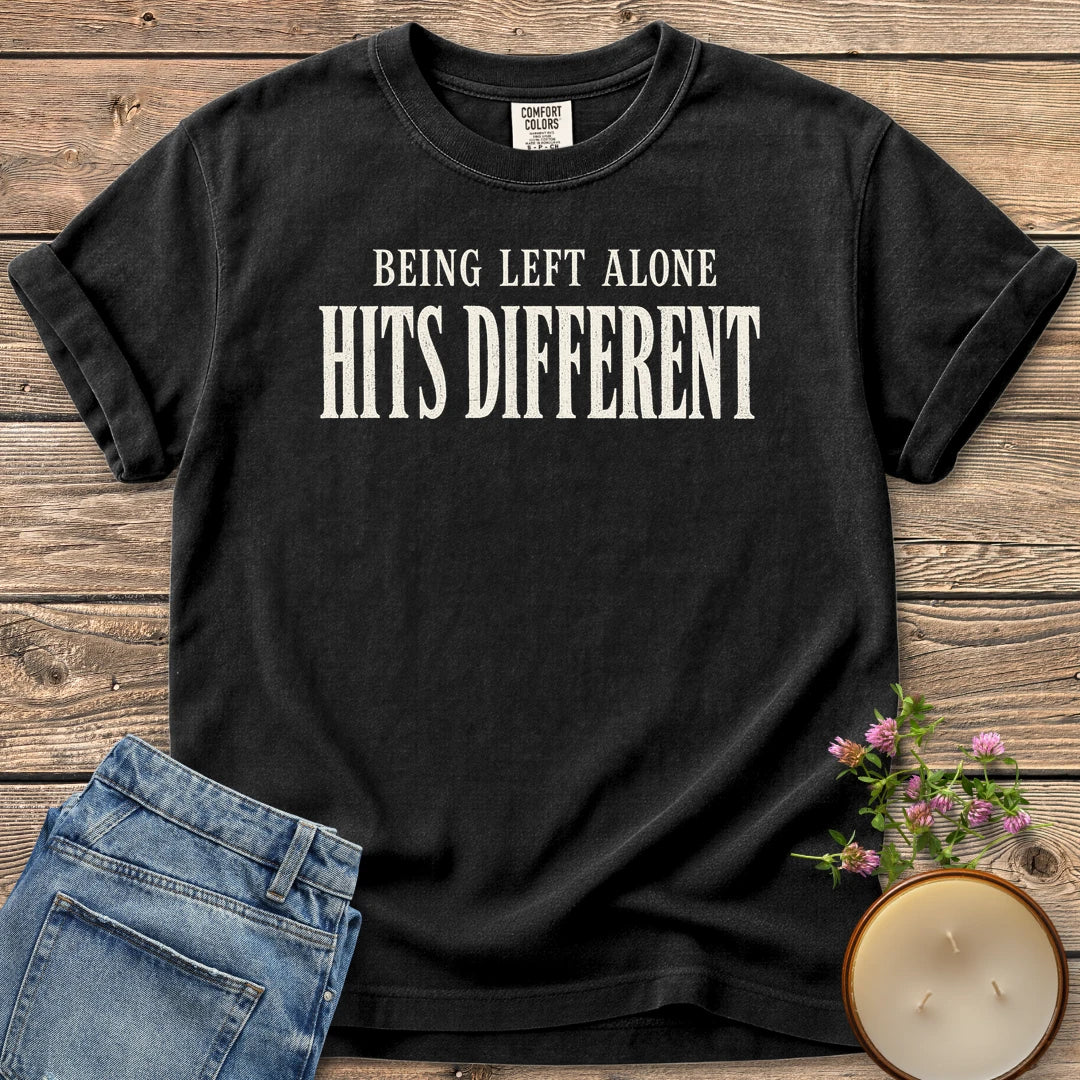 Being Left Alone Hits Different t-shirt, Being Left Alone Hits Different in distressed vintage type, on a Black Comfort Colors tee