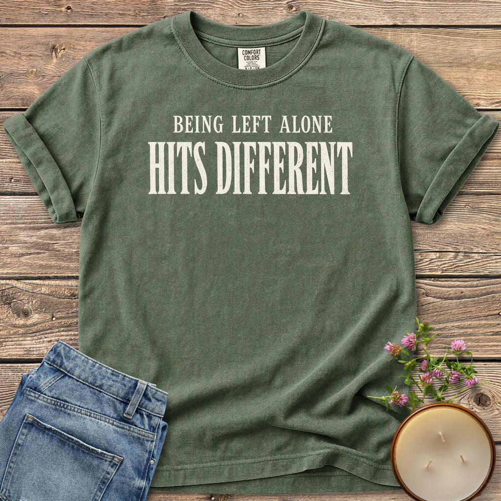 Being Left Alone Hits Different t-shirt, Being Left Alone Hits Different in distressed vintage type, on a Moss Comfort Colors tee