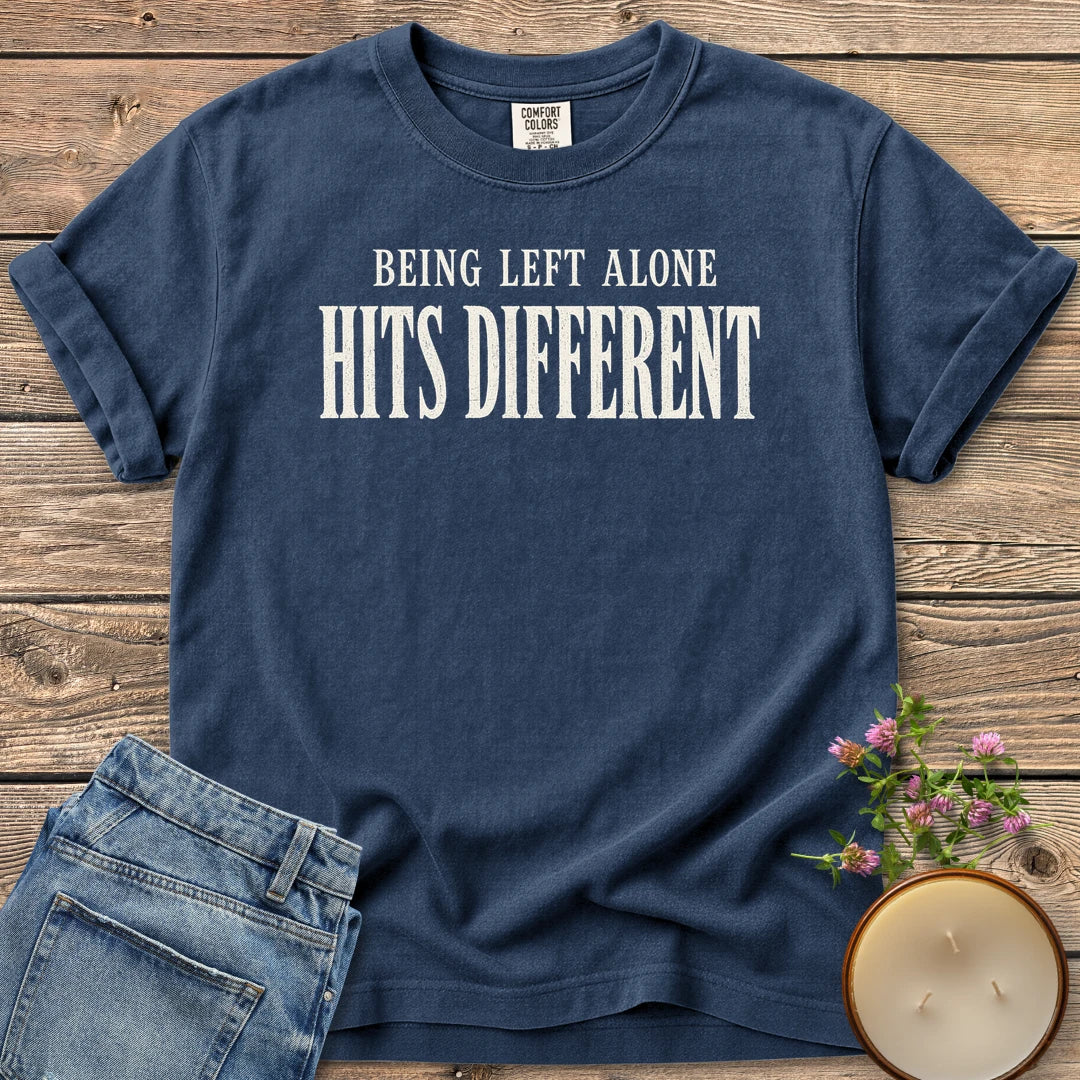 Being Left Alone Hits Different t-shirt, Being Left Alone Hits Different in distressed vintage type, on a Navy Comfort Colors tee