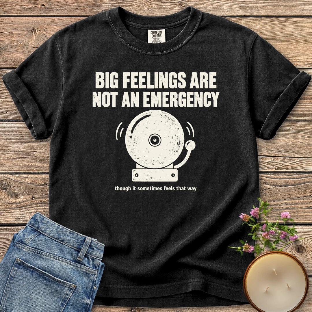 Big Feelings Not An Emergency t-shirt, Big Feelings Are Not An Emergency above a ringing alarm bell, on a Black Comfort Colors tee