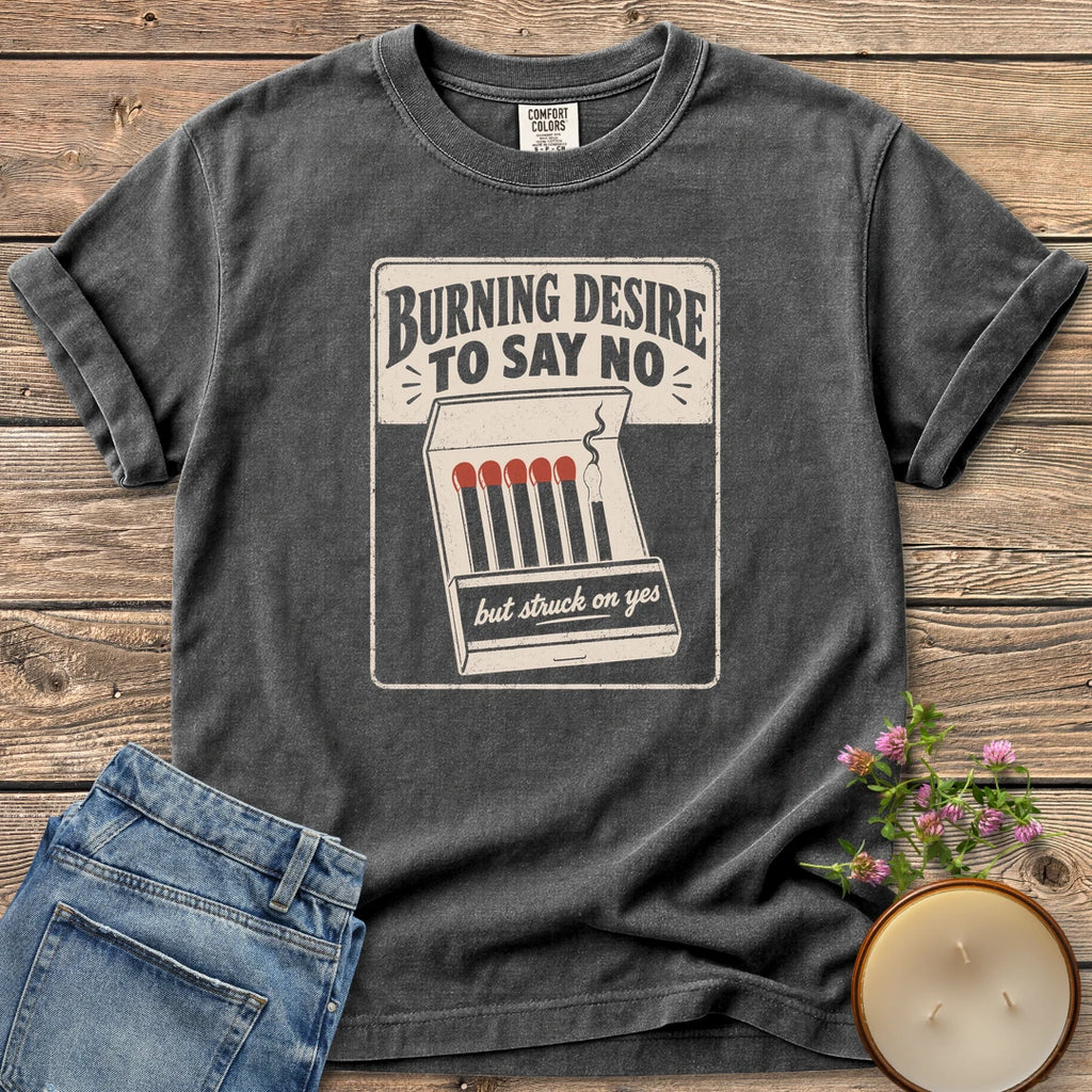 Burning Desire To Say No t-shirt, a vintage matchbook reading Burning Desire To Say No with but struck on yes, on a Pepper Comfort Colors tee