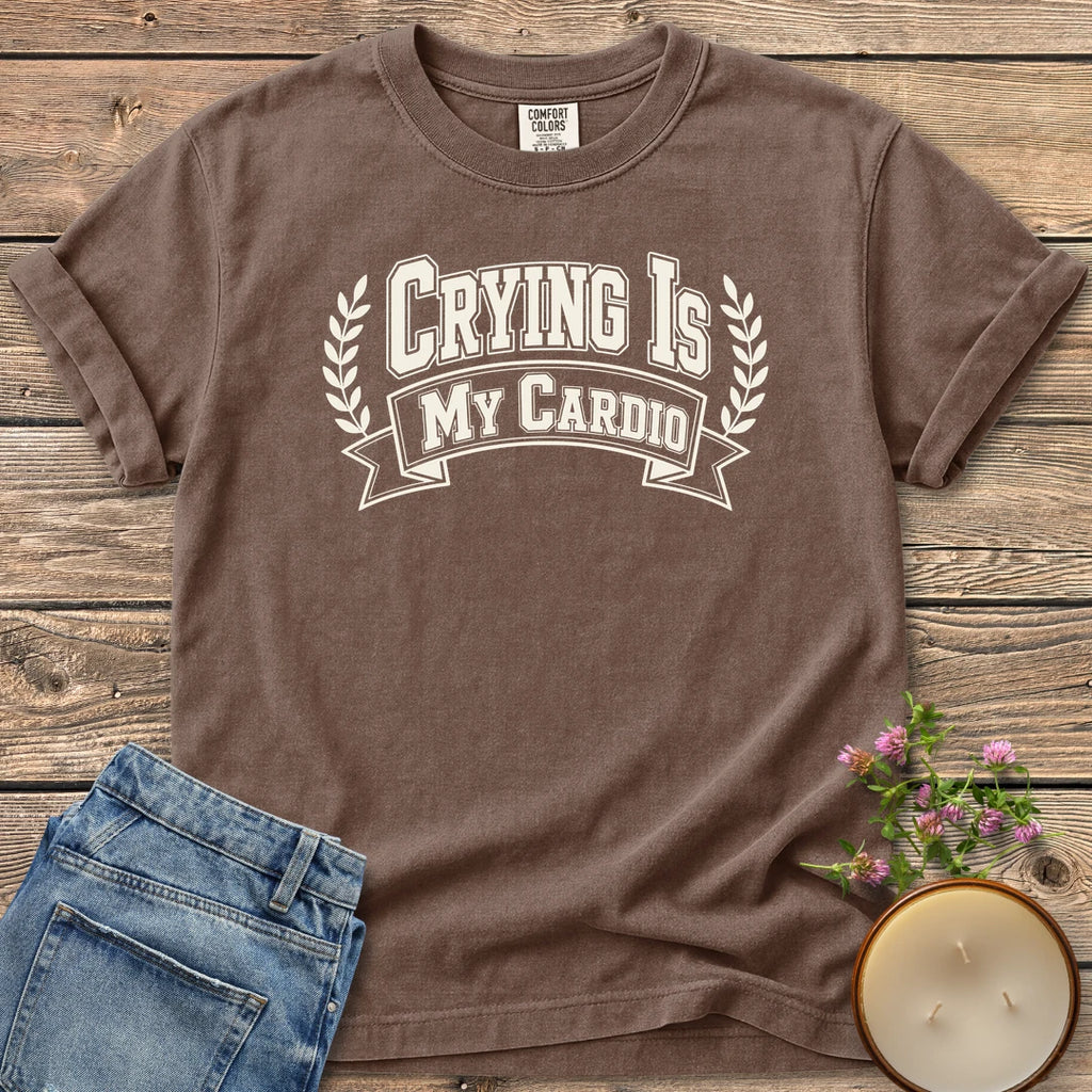 Crying Is My Cardio t-shirt, Crying Is My Cardio in varsity letters on a banner with laurel branches, on an Espresso Comfort Colors tee