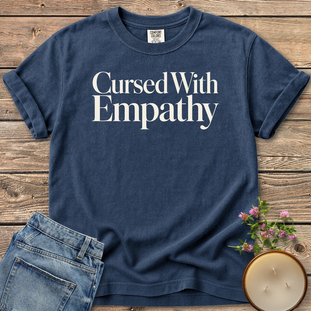 Cursed With Empathy t-shirt, Cursed With Empathy in elegant serif type, on a Navy Comfort Colors tee