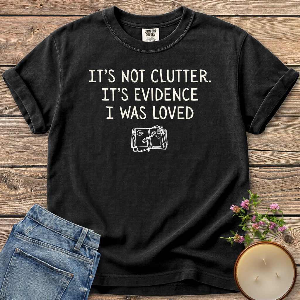 Evidence I Was Loved t-shirt, It's Not Clutter. It's Evidence I Was Loved with a tied bundle of letters, on a Black Comfort Colors tee