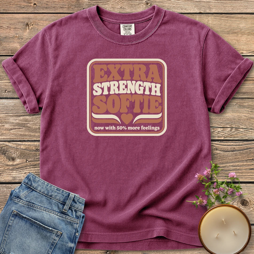 Extra Strength Softie t-shirt, a retro badge reading Extra Strength Softie with a heart and now with 50% more feelings, on a Berry Comfort Colors tee