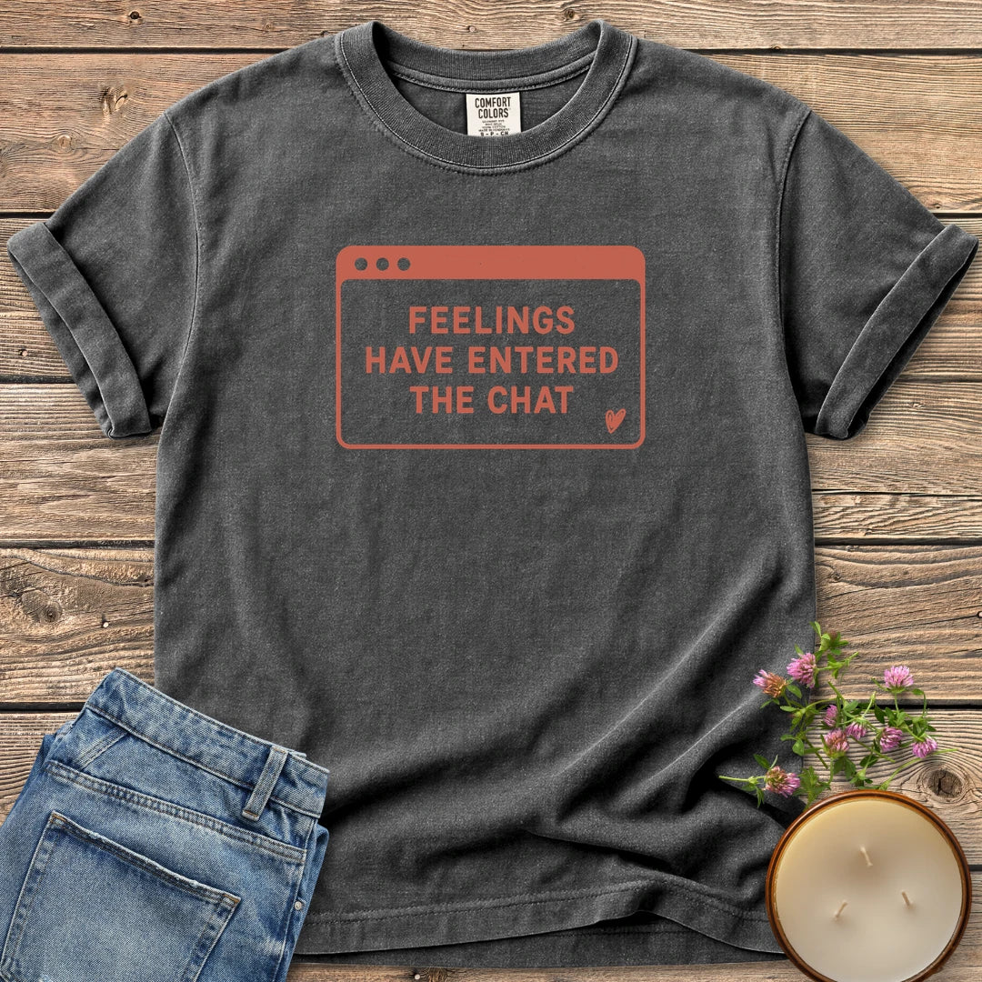 Feelings Have Entered The Chat t-shirt, a retro browser window reading Feelings Have Entered The Chat with a small heart, on a Pepper Comfort Colors tee