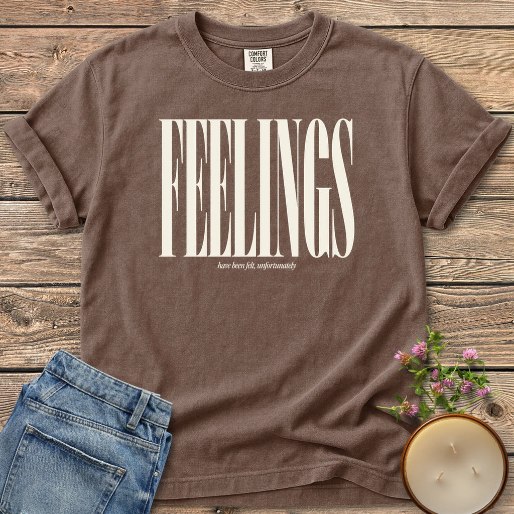Feelings Unfortunately t-shirt, FEELINGS in tall condensed type with have been felt, unfortunately, on an Espresso Comfort Colors tee