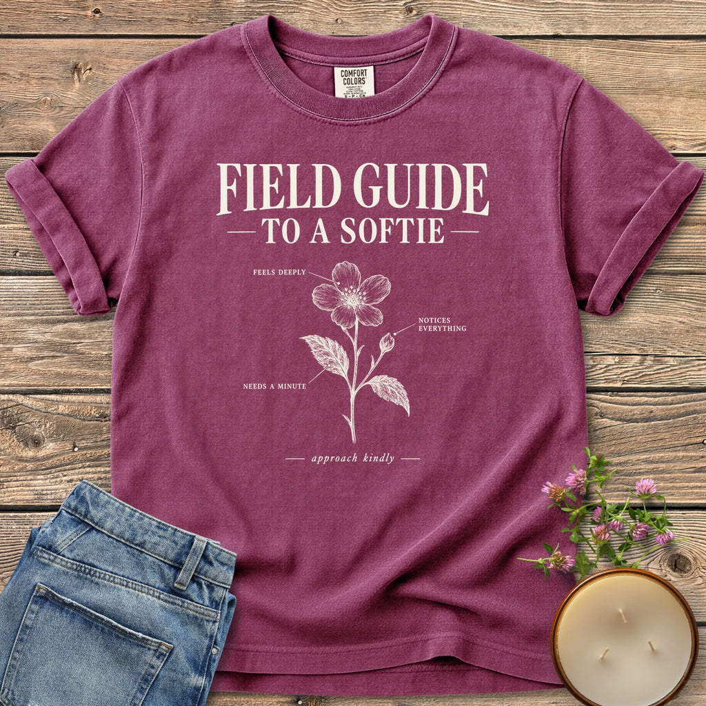 Field Guide To A Softie t-shirt, Field Guide To A Softie with a labeled flower reading feels deeply, notices everything, needs a minute, on a Berry Comfort Colors tee
