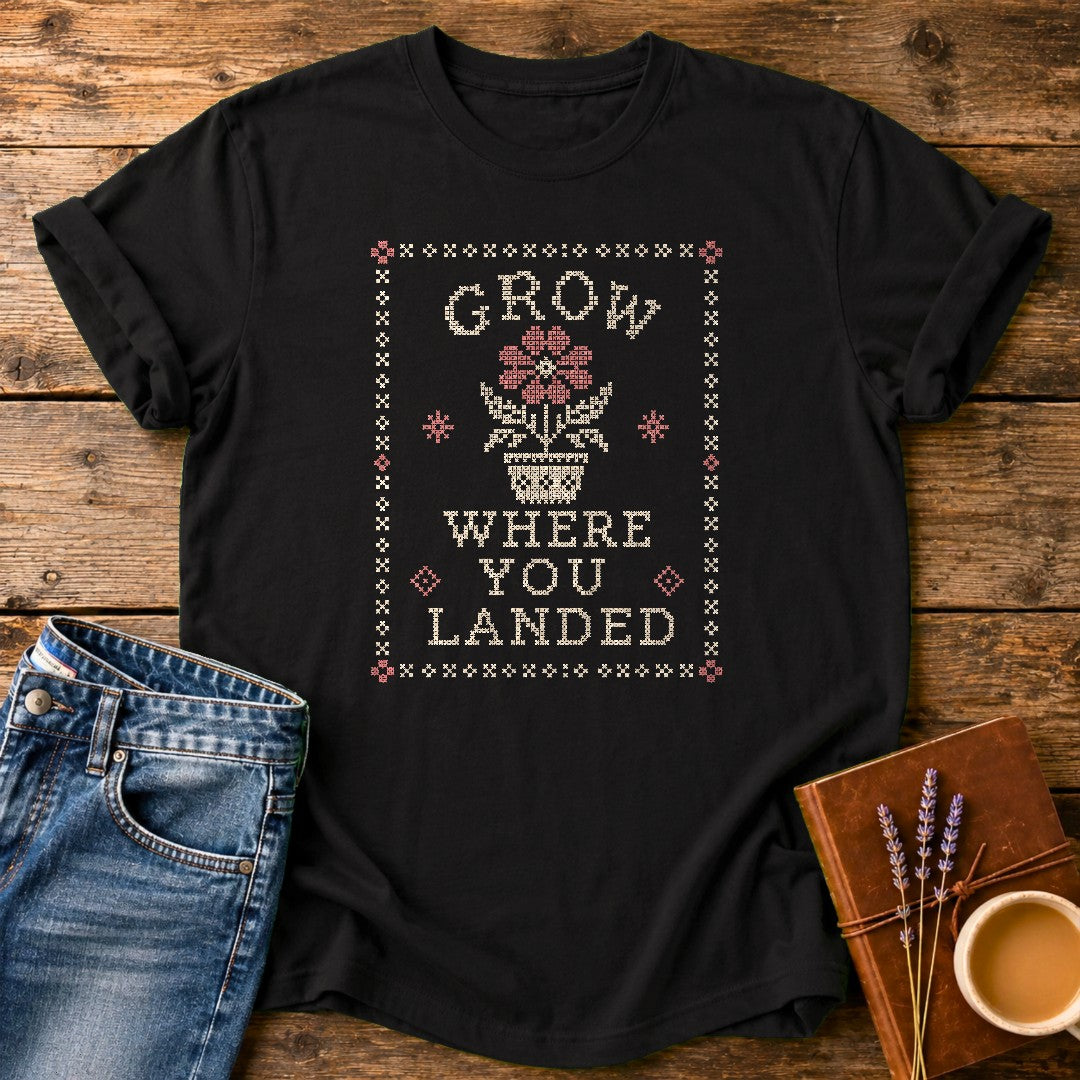 Grow Where You Landed — Black garment-dyed tee
