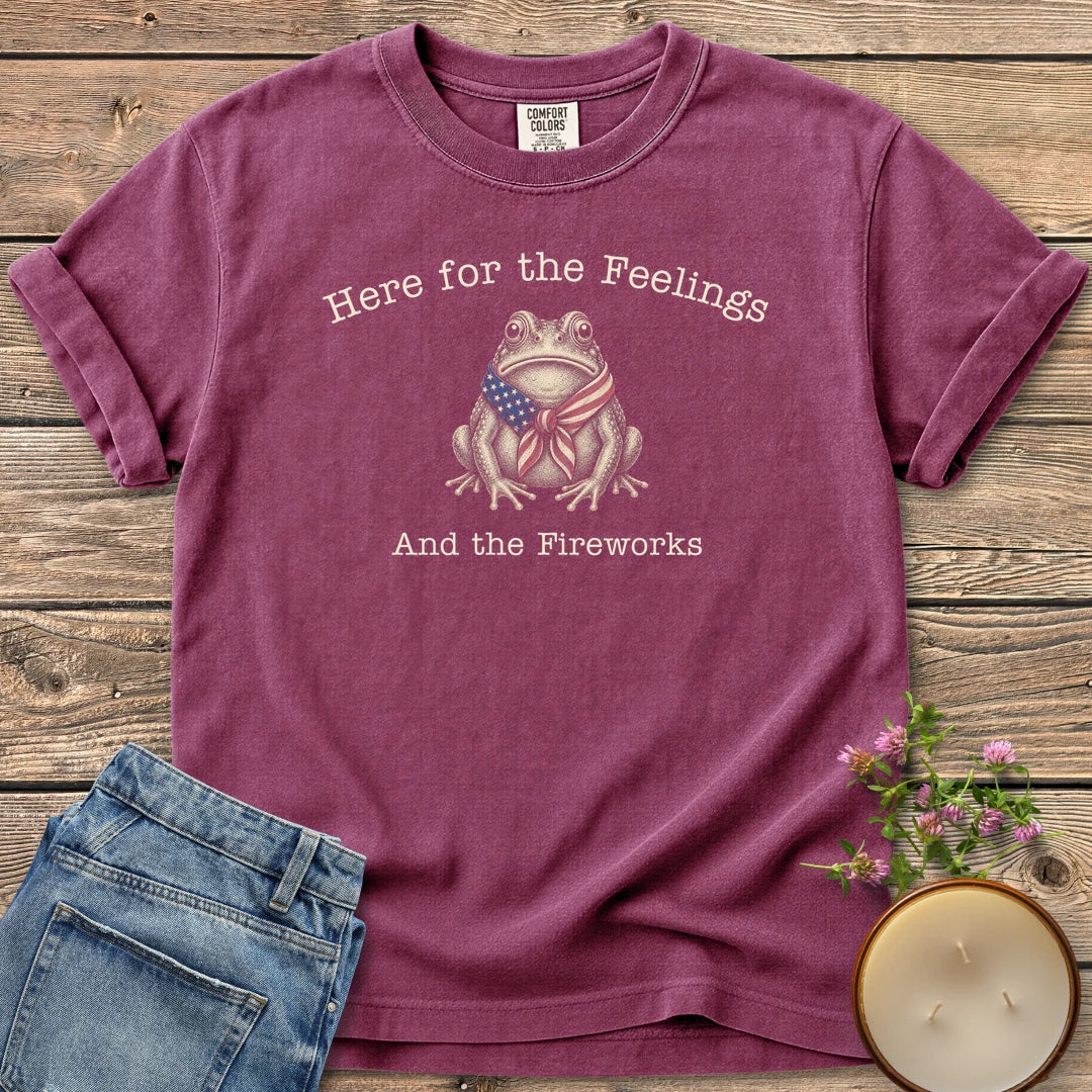 Here for the Feelings t-shirt, a toad in a stars and stripes bandana between Here for the Feelings and And the Fireworks, on a Berry Comfort Colors tee
