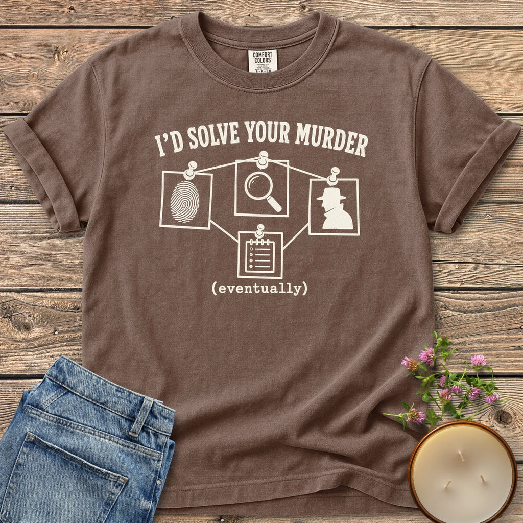 I'd Solve Your Murder Eventually t-shirt, I'd Solve Your Murder above a pinned evidence board and (eventually), on an Espresso Comfort Colors tee