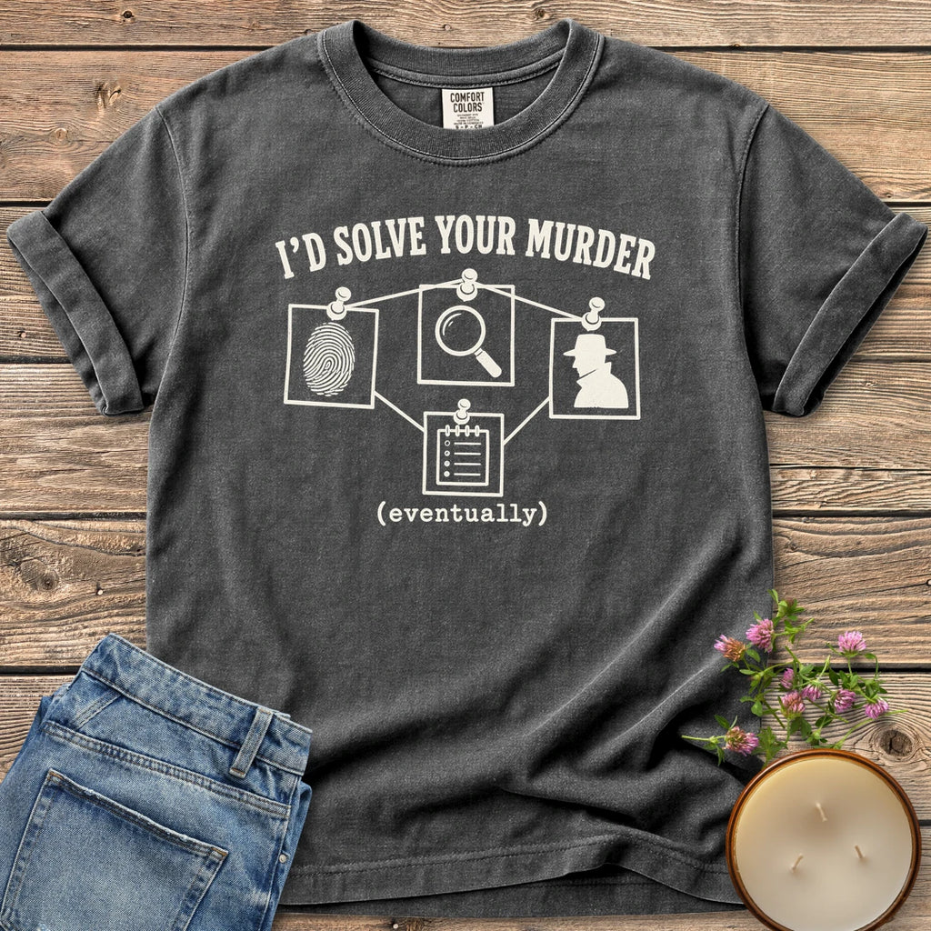 I'd Solve Your Murder Eventually t-shirt, I'd Solve Your Murder above a pinned evidence board and (eventually), on a Pepper Comfort Colors tee