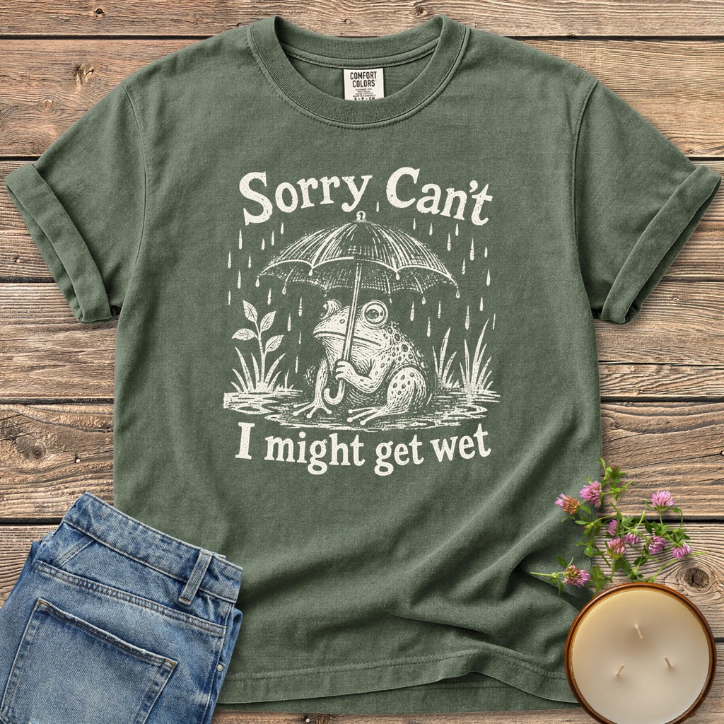 I Might Get Wet t-shirt, a frog under an umbrella in the rain between Sorry Can't and I might get wet, on a Moss Comfort Colors tee
