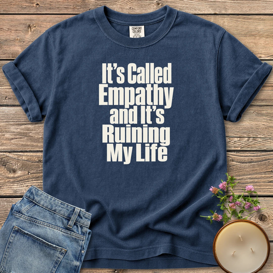 It's Called Empathy t-shirt, It's Called Empathy and It's Ruining My Life in bold condensed type, on a Navy Comfort Colors tee