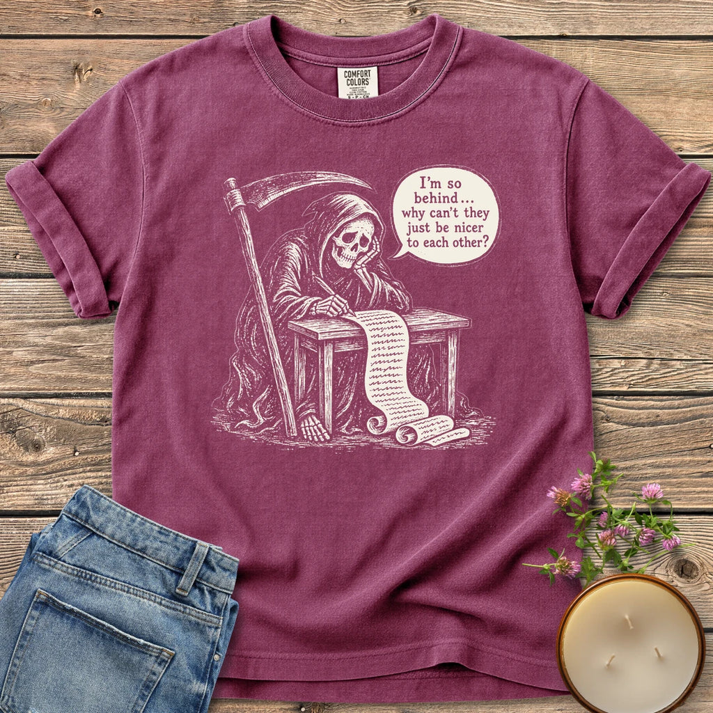 Just Be Nicer t-shirt, a grim reaper at a desk with a long list saying I'm so behind, why can't they just be nicer to each other?, on a Berry Comfort Colors tee