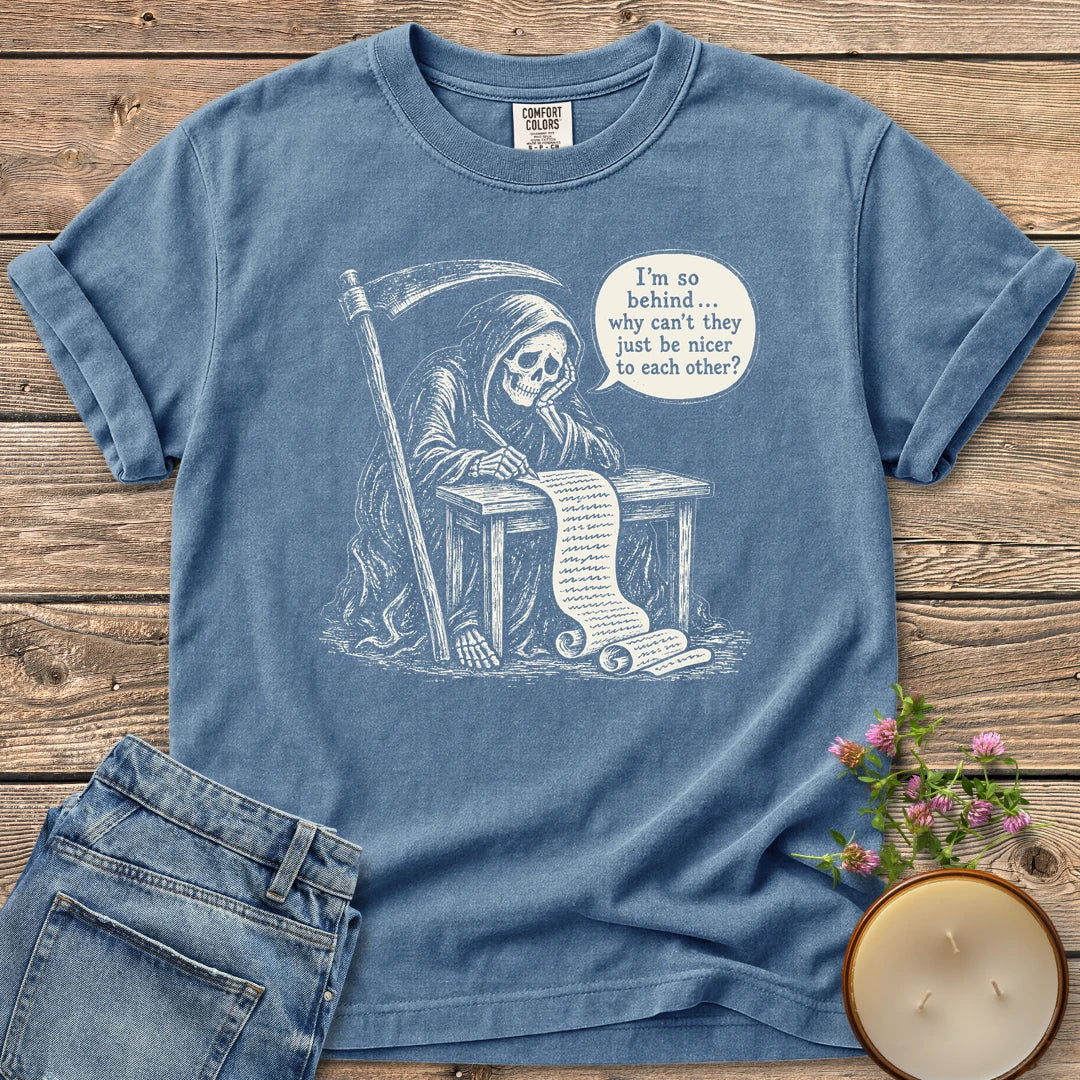 Just Be Nicer t-shirt, a grim reaper at a desk with a long list saying I'm so behind, why can't they just be nicer to each other?, on a Blue Jean Comfort Colors tee