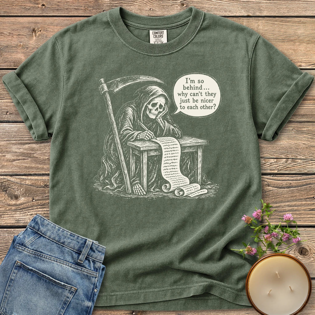 Just Be Nicer t-shirt, a grim reaper at a desk with a long list saying I'm so behind, why can't they just be nicer to each other?, on a Moss Comfort Colors tee