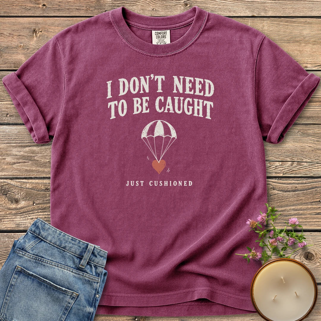Just Cushioned t-shirt, I Don't Need To Be Caught with a heart on a parachute and Just Cushioned, on a Berry Comfort Colors tee