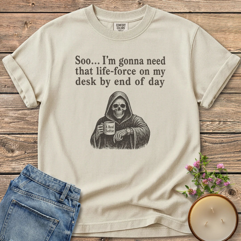 Life-Force On My Desk t-shirt, a grim reaper holding an A Real Softie mug and checking his watch under Soo... I'm gonna need that life-force on my desk by end of day, on an Ivory Comfort Colors tee