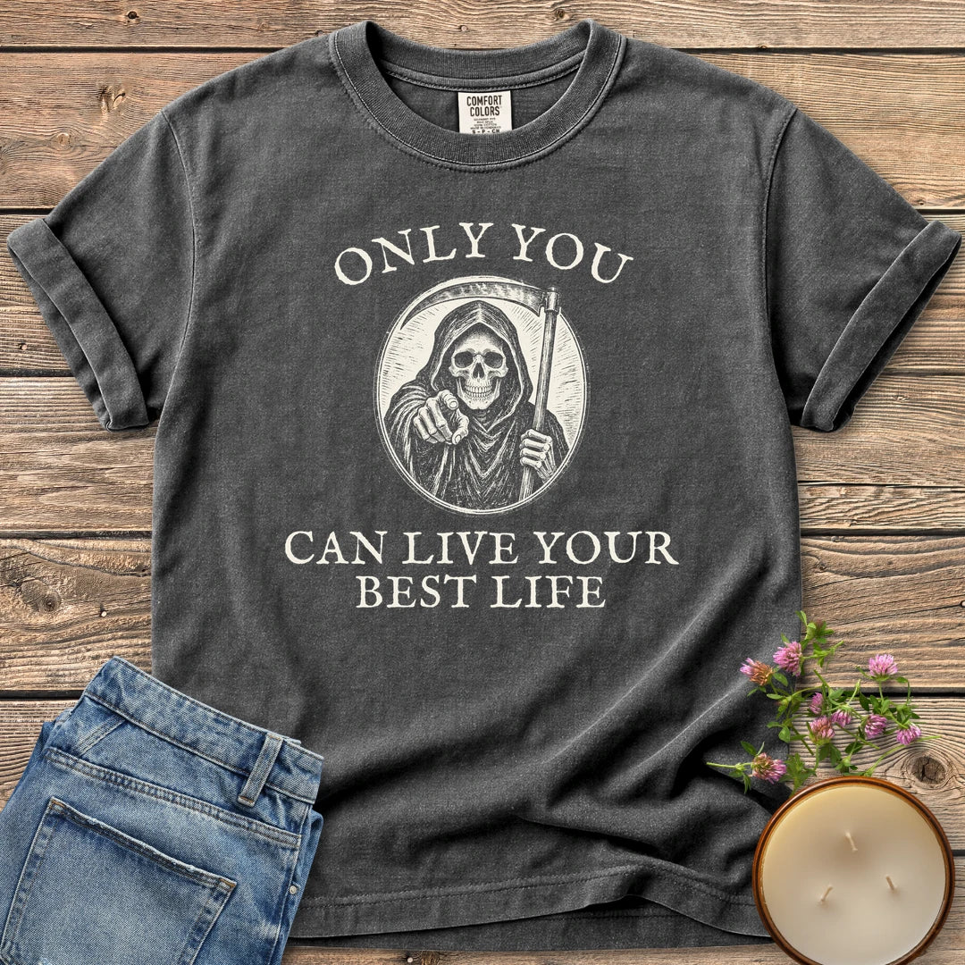 Live Your Best Life t-shirt, a grim reaper pointing out of a circle between Only You and Can Live Your Best Life, on a Pepper Comfort Colors tee