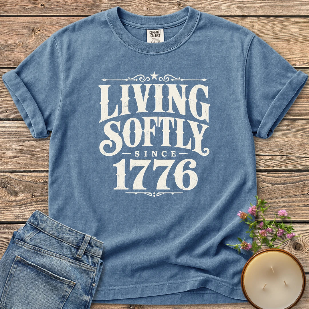 Living Softly Since 1776 t-shirt, Living Softly Since 1776 in ornate vintage type, on a Blue Jean Comfort Colors tee