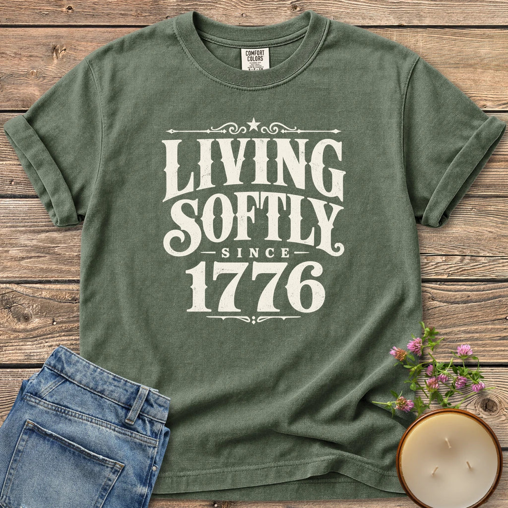 Living Softly Since 1776 t-shirt, Living Softly Since 1776 in ornate vintage type, on a Moss Comfort Colors tee