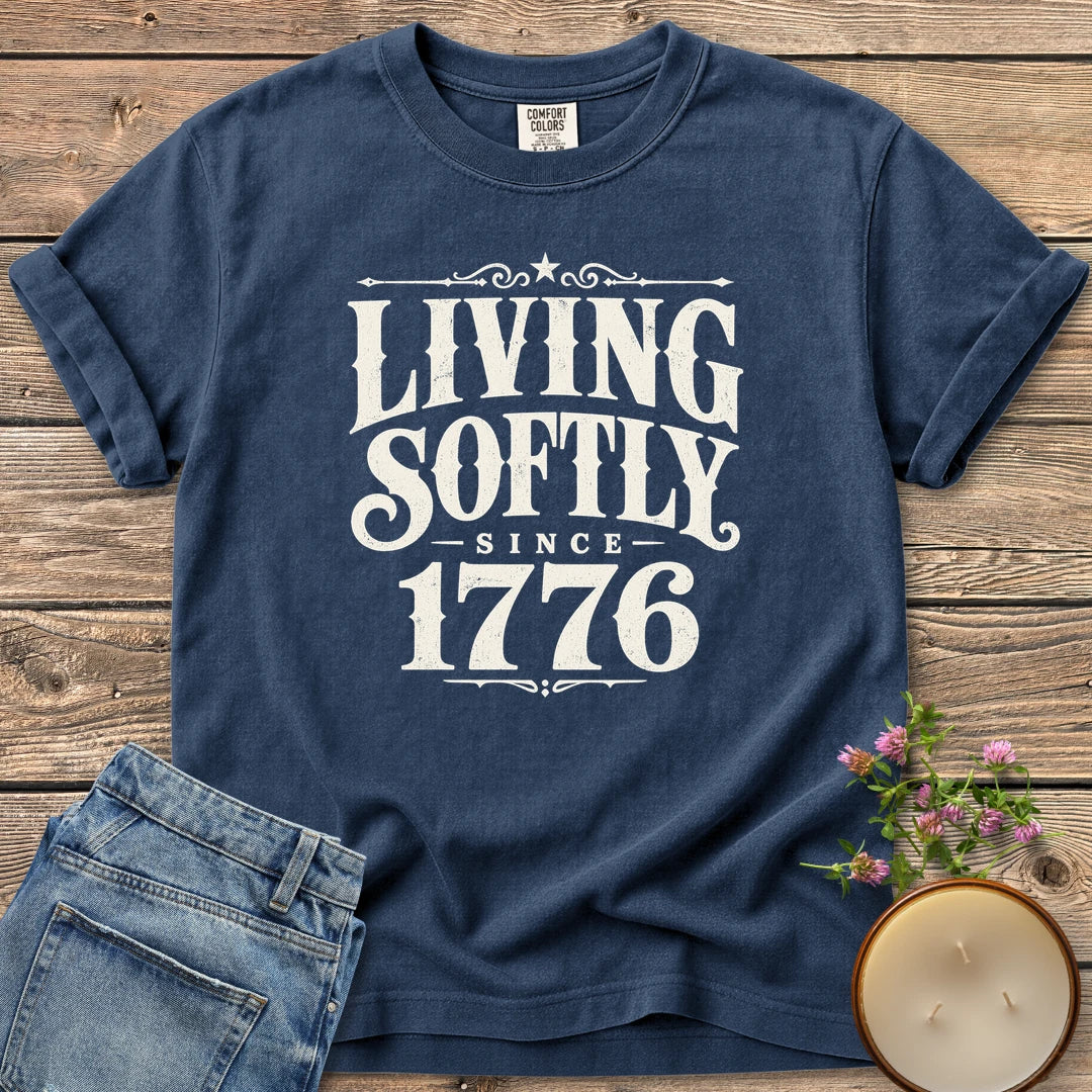 Living Softly Since 1776 t-shirt, Living Softly Since 1776 in ornate vintage type, on a Navy Comfort Colors tee