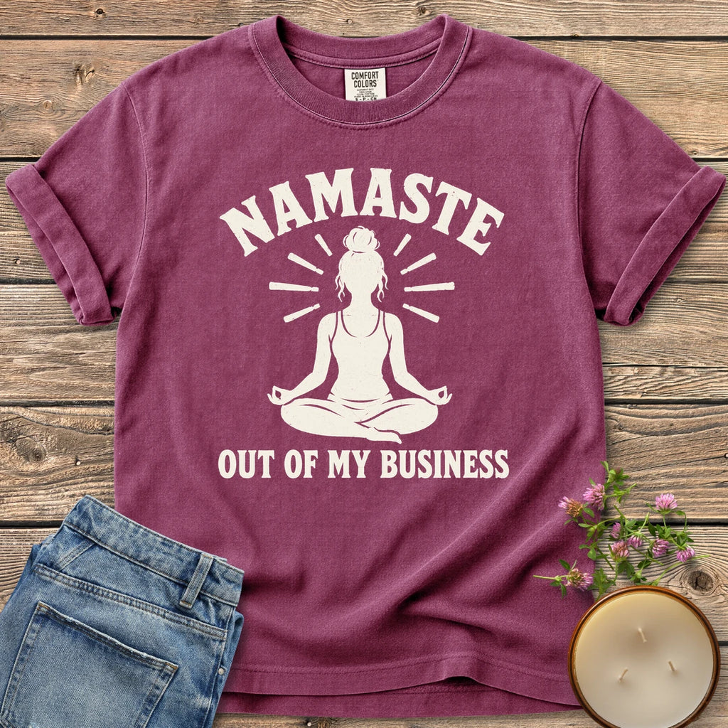 Namaste Out Of My Business t-shirt, a meditating woman under Namaste above Out Of My Business, on a Berry Comfort Colors tee