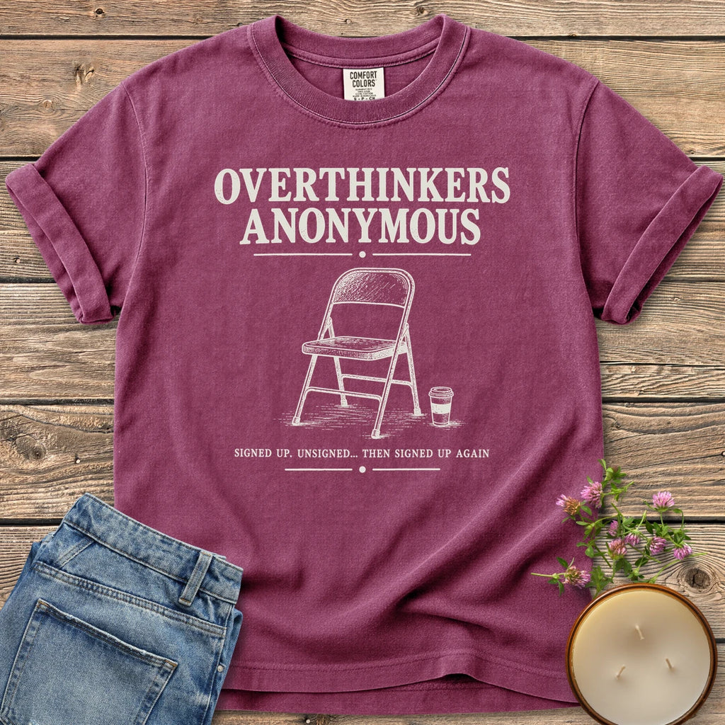 Overthinkers Anonymous t-shirt, Overthinkers Anonymous with a folding chair and Signed Up. Unsigned... Then Signed Up Again, on a Berry Comfort Colors tee