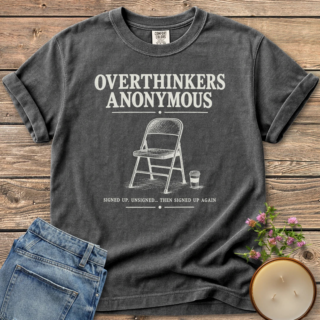 Overthinkers Anonymous t-shirt, Overthinkers Anonymous with a folding chair and Signed Up. Unsigned... Then Signed Up Again, on a Pepper Comfort Colors tee