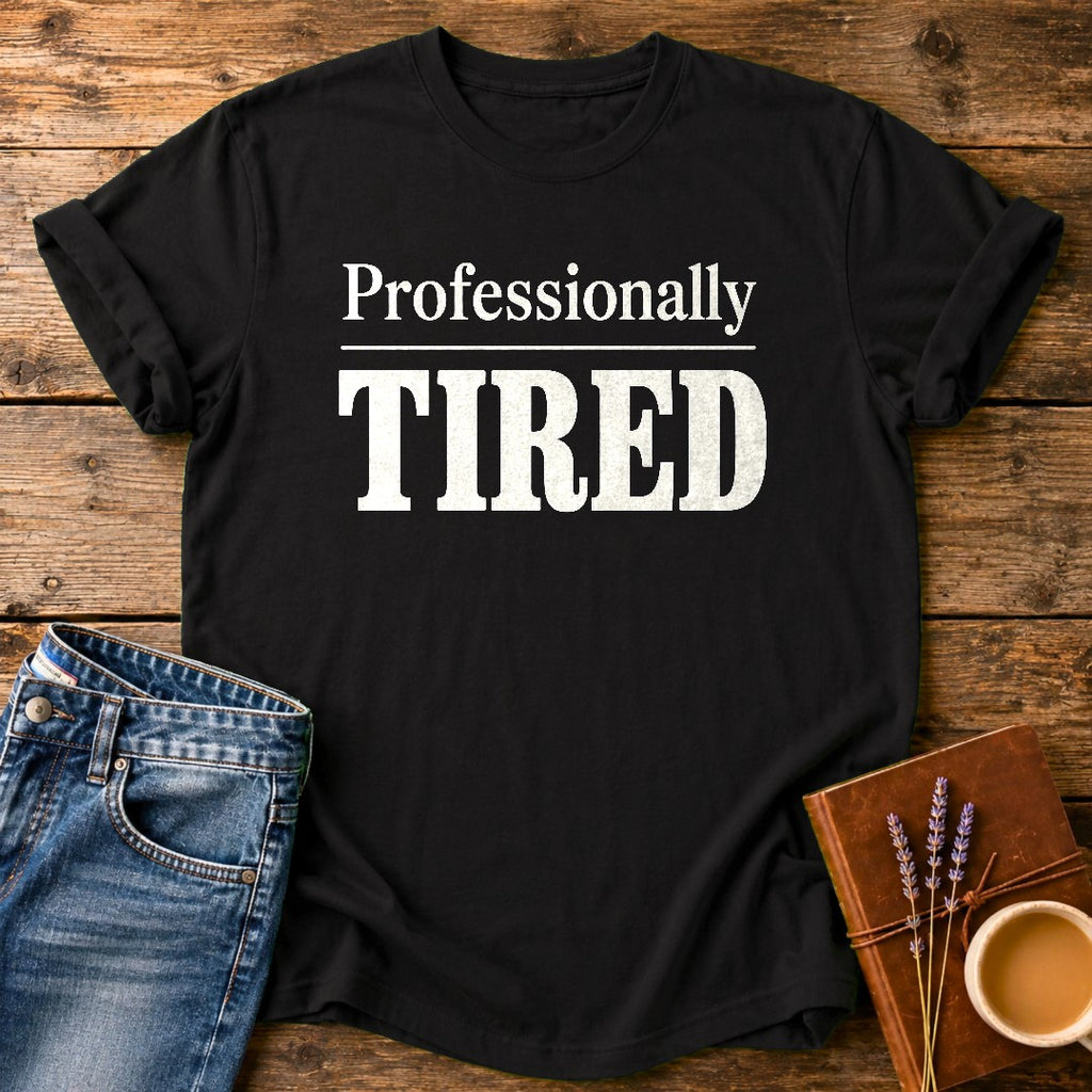 Professionally Tired — Black garment-dyed tee