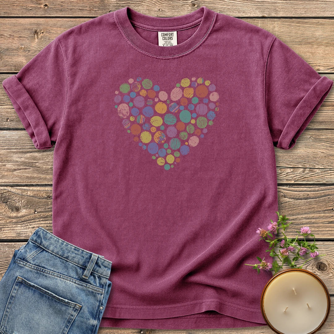 Rainbow Stipple Heart t-shirt, a heart made of colorful textured circles, on a Berry Comfort Colors tee