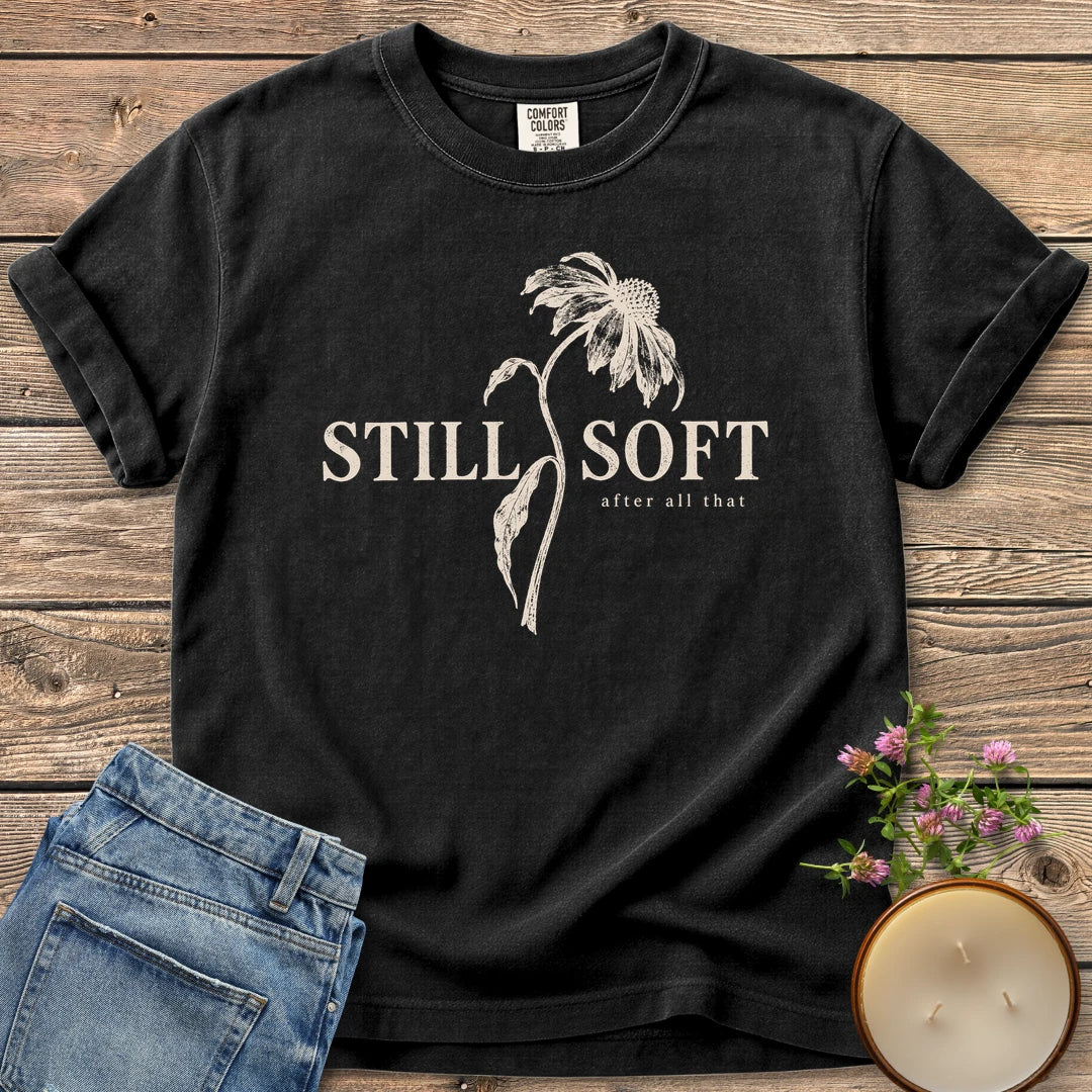 Soft After All That Botanical t-shirt, Still Soft after all that with a drooping coneflower stem, on a Black Comfort Colors tee