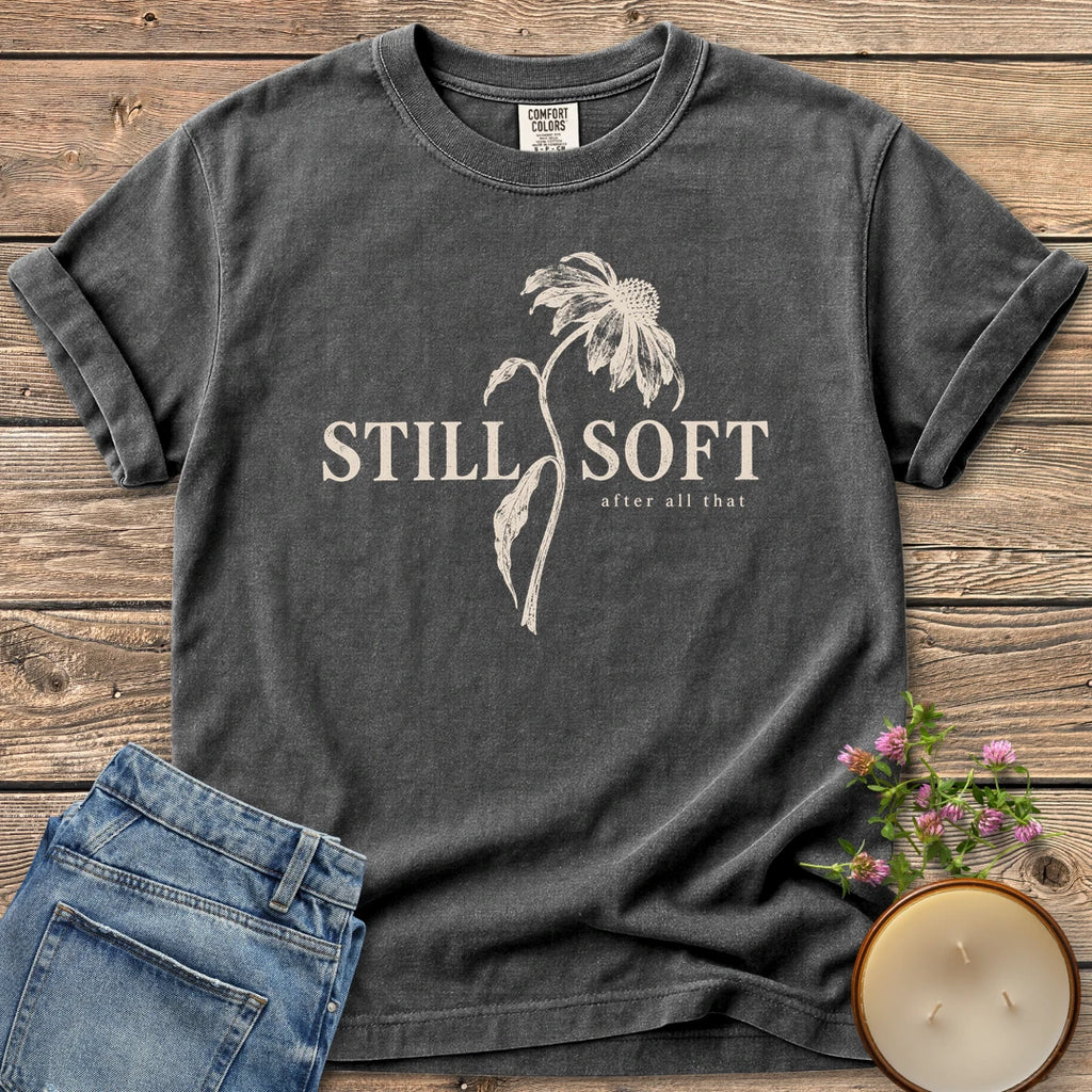 Soft After All That Botanical t-shirt, Still Soft after all that with a drooping coneflower stem, on a Pepper Comfort Colors tee