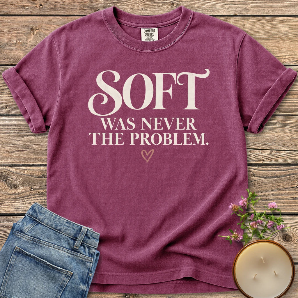 Soft Was Never The Problem t-shirt, Soft Was Never The Problem in bold vintage serif with a small heart, on a Berry Comfort Colors tee