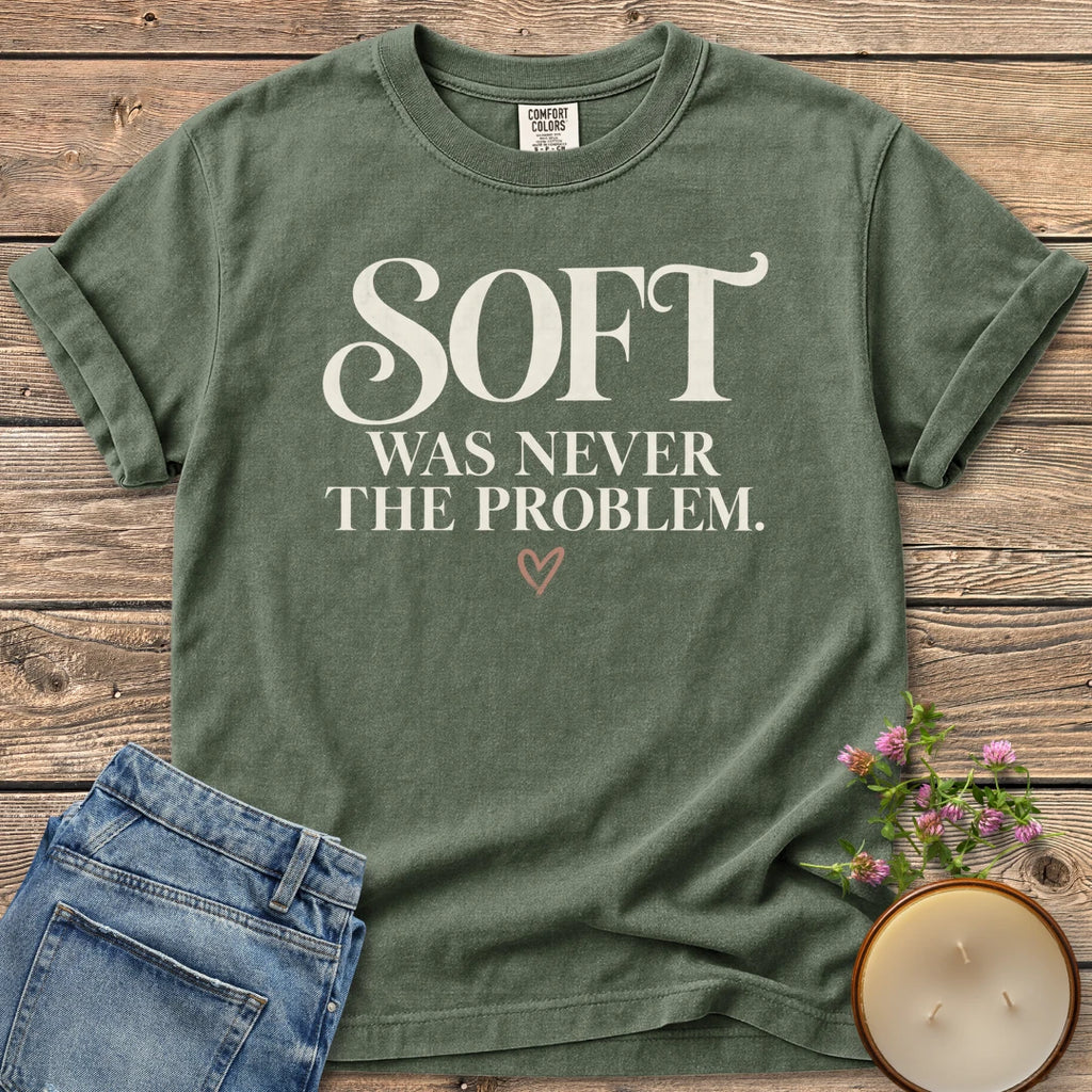 Soft Was Never The Problem t-shirt, Soft Was Never The Problem in bold vintage serif with a small heart, on a Moss Comfort Colors tee