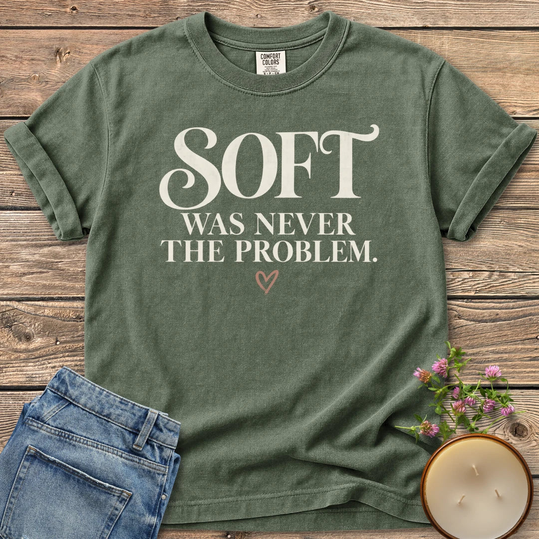 Soft Was Never The Problem t-shirt, Soft Was Never The Problem in bold vintage serif with a small heart, on a Moss Comfort Colors tee