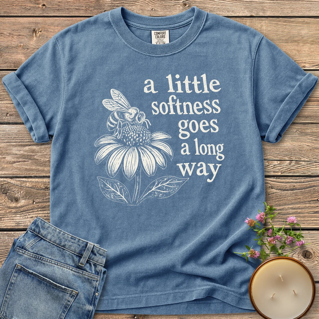 Softness Goes a Long Way t-shirt, a bee on a coneflower with a little softness goes a long way, on a Blue Jean Comfort Colors tee