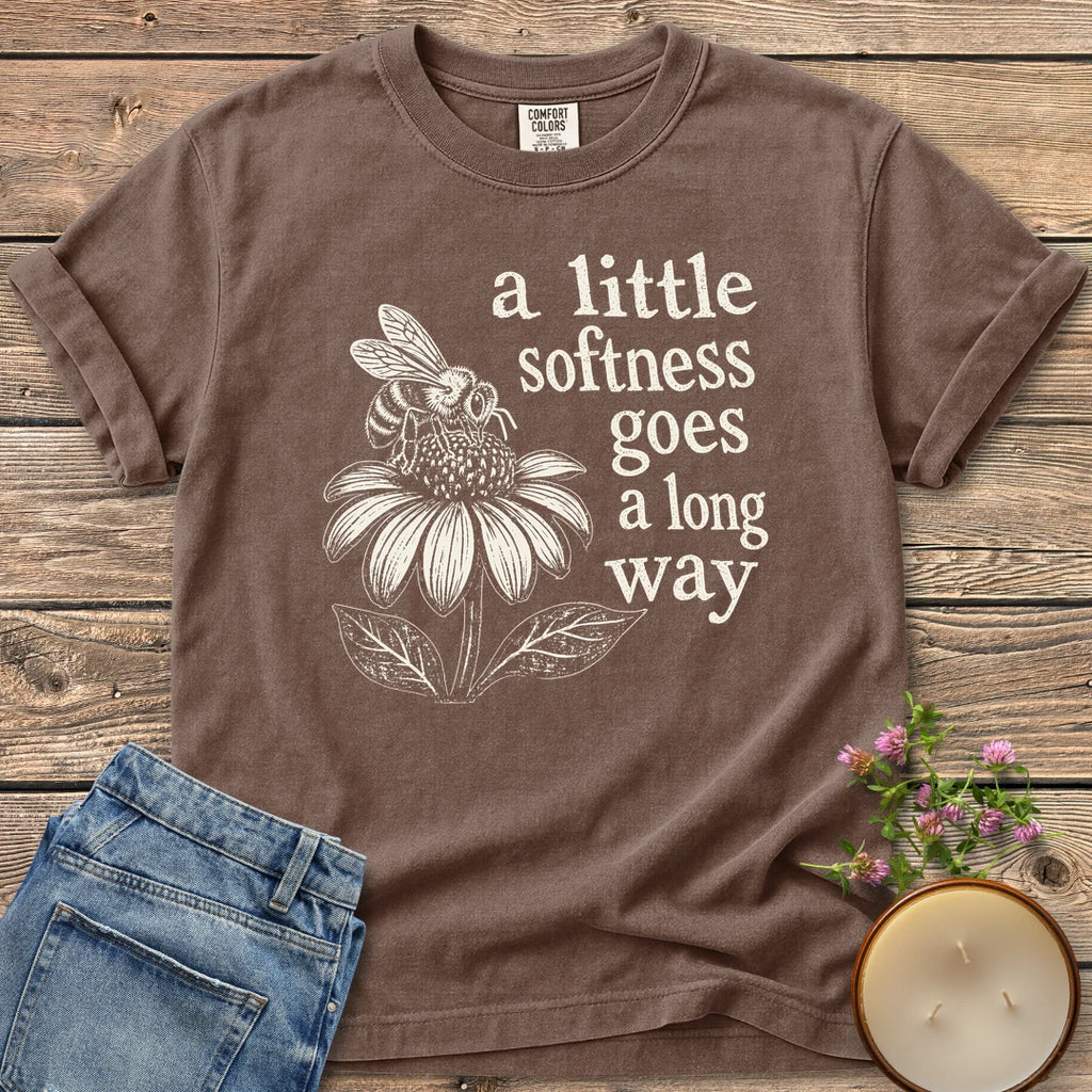 Softness Goes a Long Way t-shirt, a bee on a coneflower with a little softness goes a long way, on an Espresso Comfort Colors tee