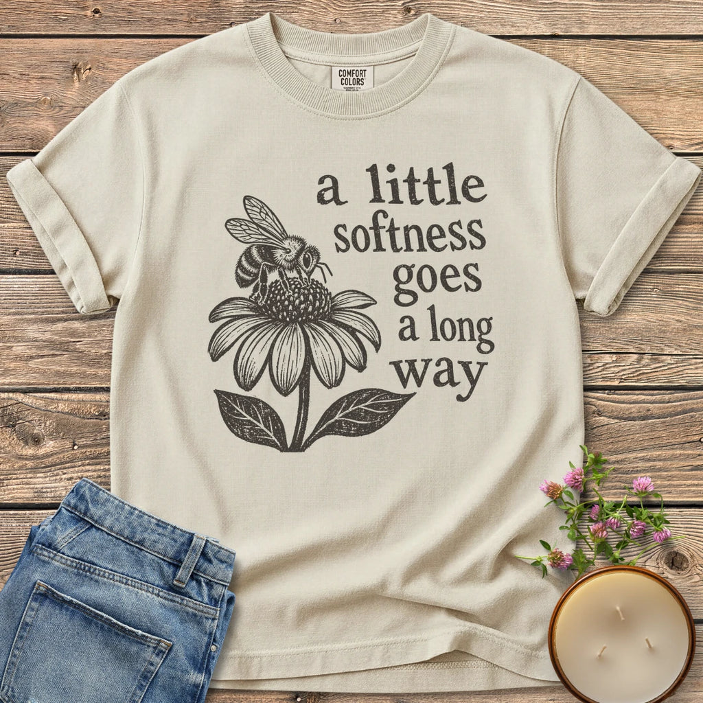 Softness Goes a Long Way t-shirt, a bee on a coneflower with a little softness goes a long way, on an Ivory Comfort Colors tee
