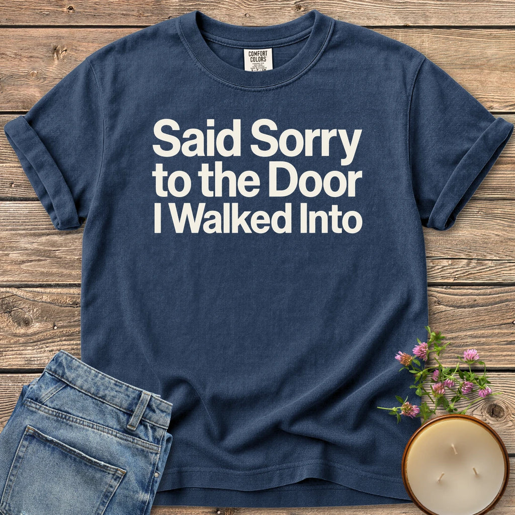 Sorry to the Door t-shirt, Said Sorry to the Door I Walked Into in bold sans type, on a Navy Comfort Colors tee